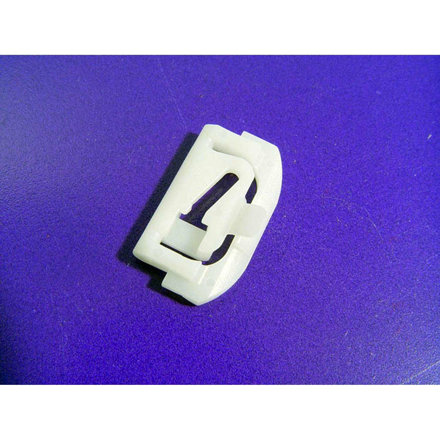 1977 Cadillac DeVille Lower Side Window Reveal Molding Clip.  Made of nylon-WF 214